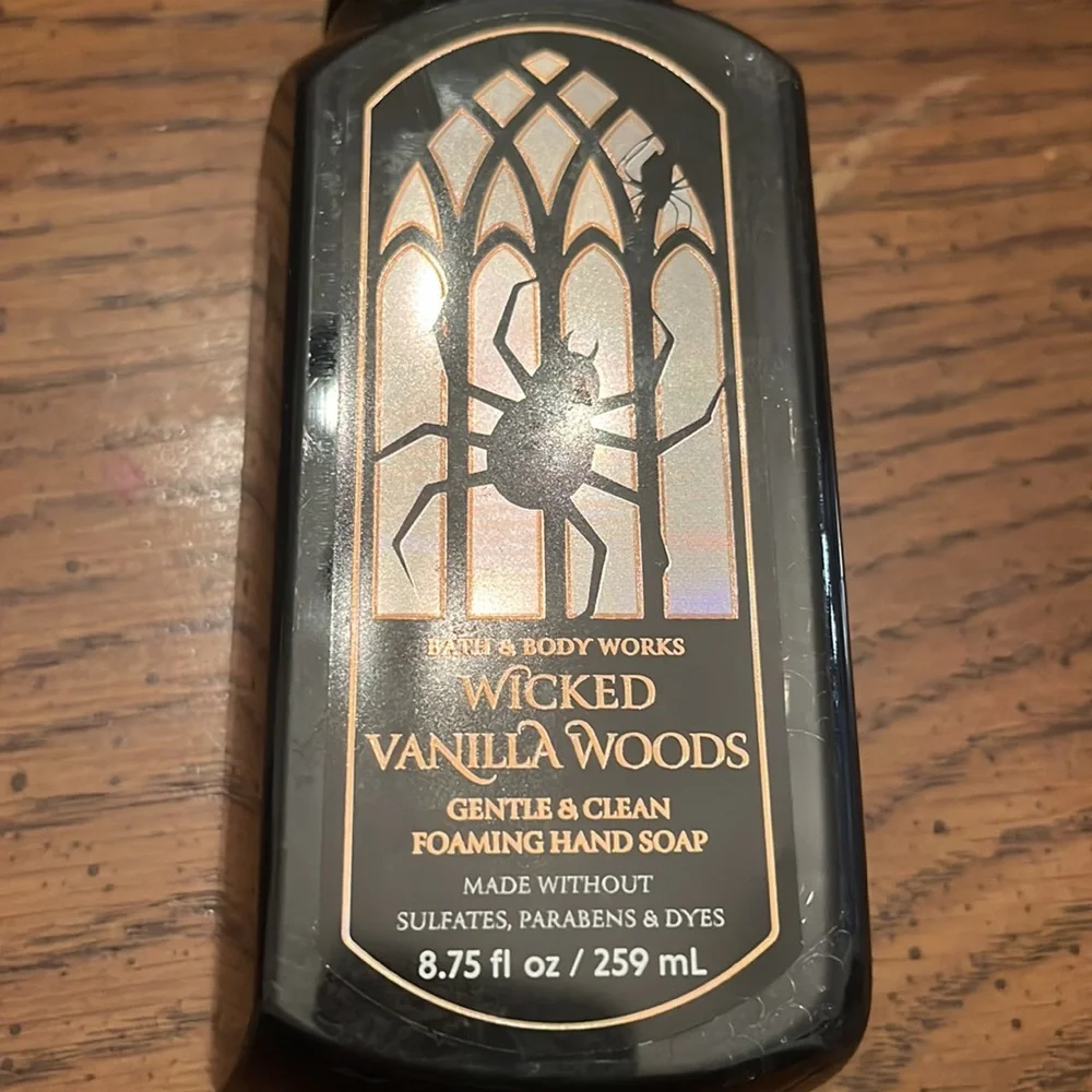 Bath & Body Works Vampire Blood candle and Wicked Vanilla Woods hand soap‎